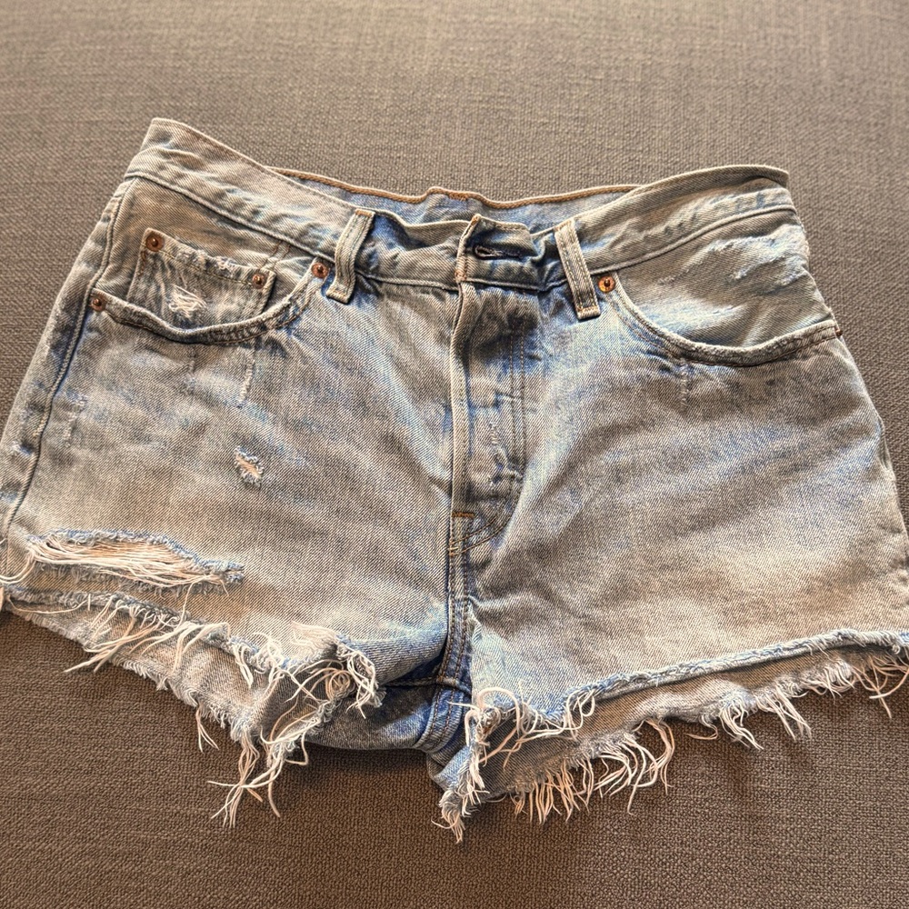 Levi’s 501 denim cutoffs. Free people